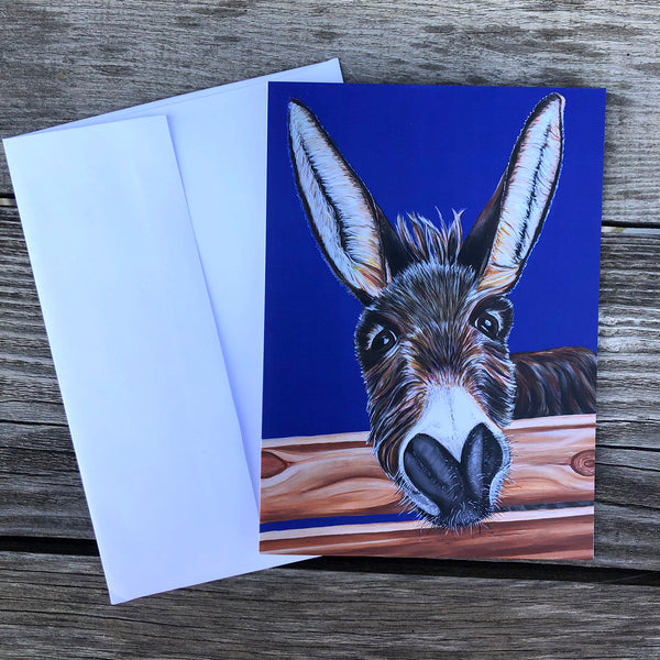 Donkey greeting card- bright blue background. Jimbob is a donkey that lives at the Isle of Wight Donkey Sanctuary in England